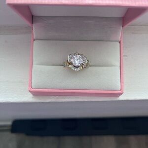 3.5 carat Art Deco style Rise ring with detailing down the sides.